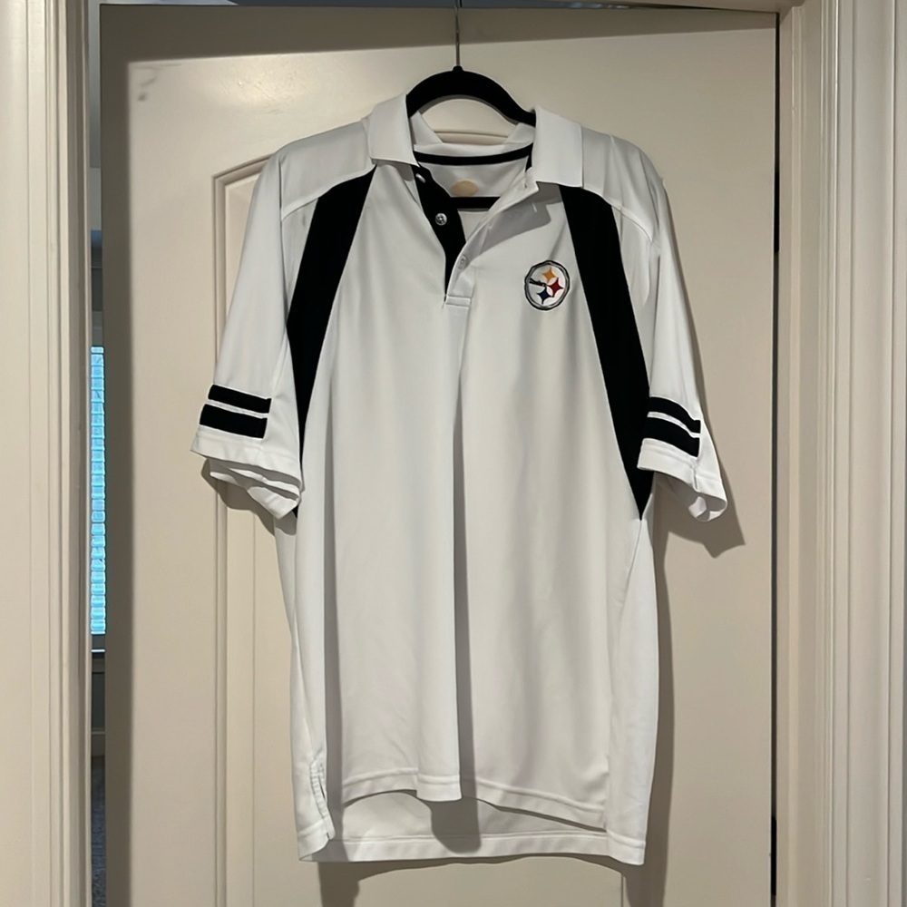 Men’s Pittsburgh Steelers White Polo Golf Shirt. Listed as a Large.